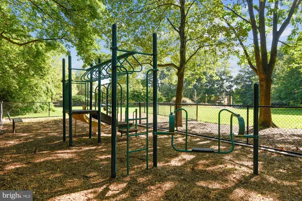 a view of a building with a street