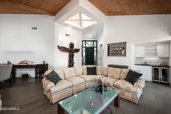 a living room with furniture and a table