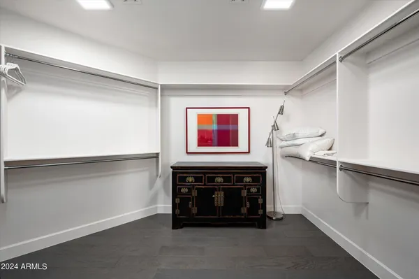 a room with a cabinets and window