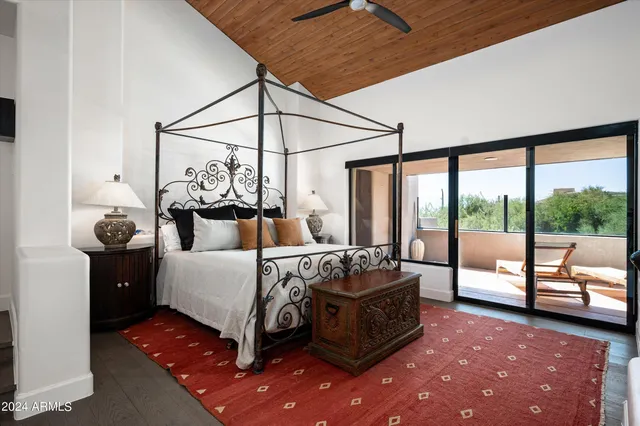 a bed room with furniture and a window