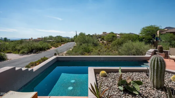 a view of balcony with a yard