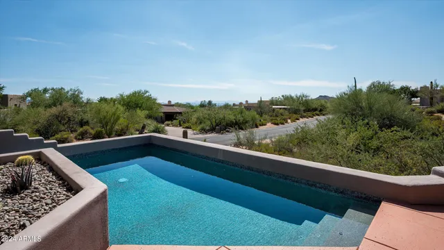 a view of balcony with furniture