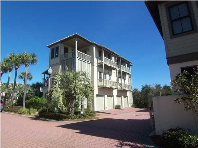 10140 Co Hwy Inlet Beach, Unit 33 30A Inlet Beach, FL 32461 - Photo 1 of 13 a front view of a house with a yard