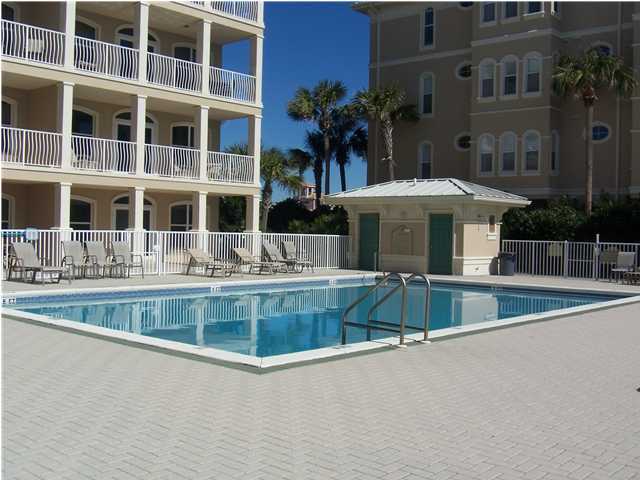 10140 Co Hwy Inlet Beach, Unit 33 30A Inlet Beach, FL 32461 - Photo 12 of 13 a view of a building with a tub and chairs