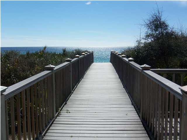 10140 Co Hwy Inlet Beach, Unit 33 30A Inlet Beach, FL 32461 - Photo 13 of 13 a balcony with wooden floor