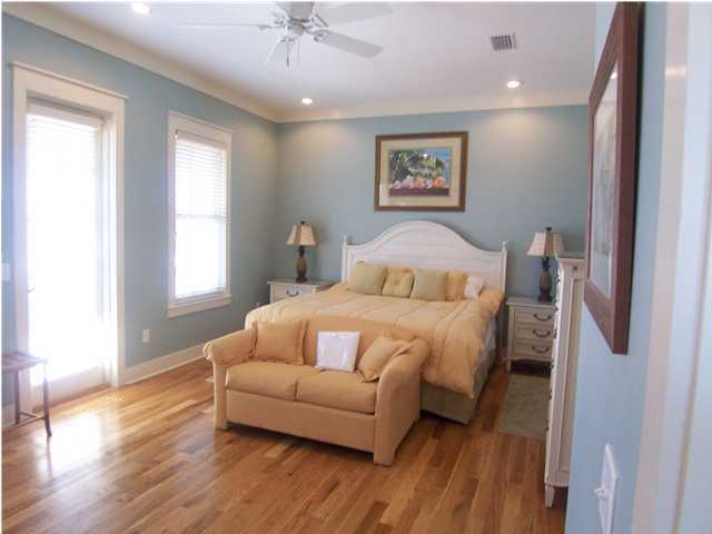 10140 Co Hwy Inlet Beach, Unit 33 30A Inlet Beach, FL 32461 - Photo 4 of 13 a bedroom with a bed couch and a window