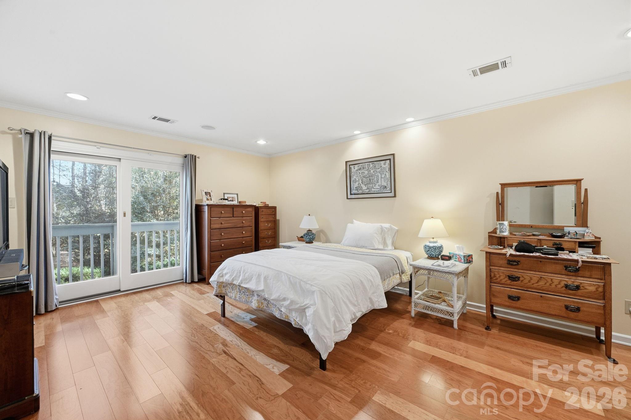 1916 Davis Road Davidson, NC 28036 - Photo 25 of 45 a bedroom with a large bed and a window