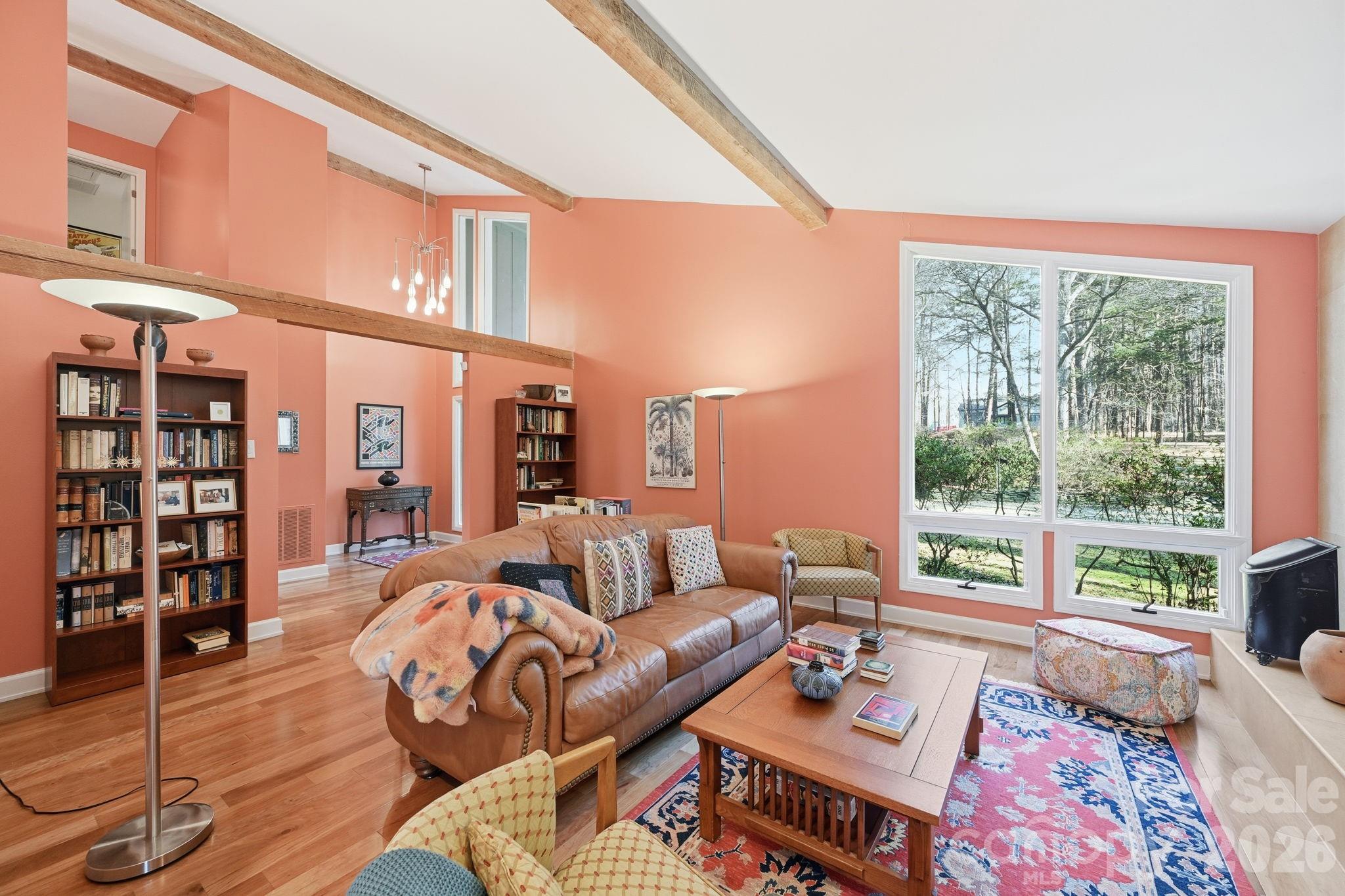 1916 Davis Road Davidson, NC 28036 - Photo 7 of 45 a living room with furniture and a large window