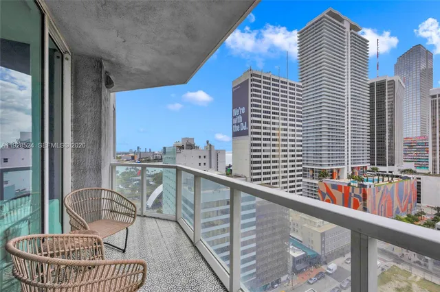 a view of balcony with furniture