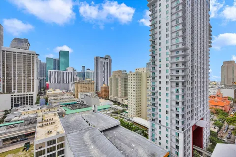 a view of city with tall buildings