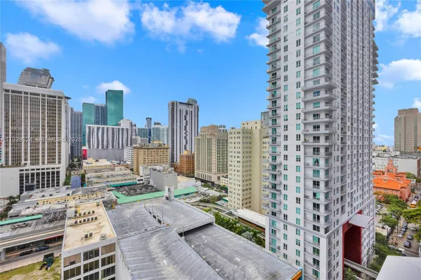 a view of city with tall buildings