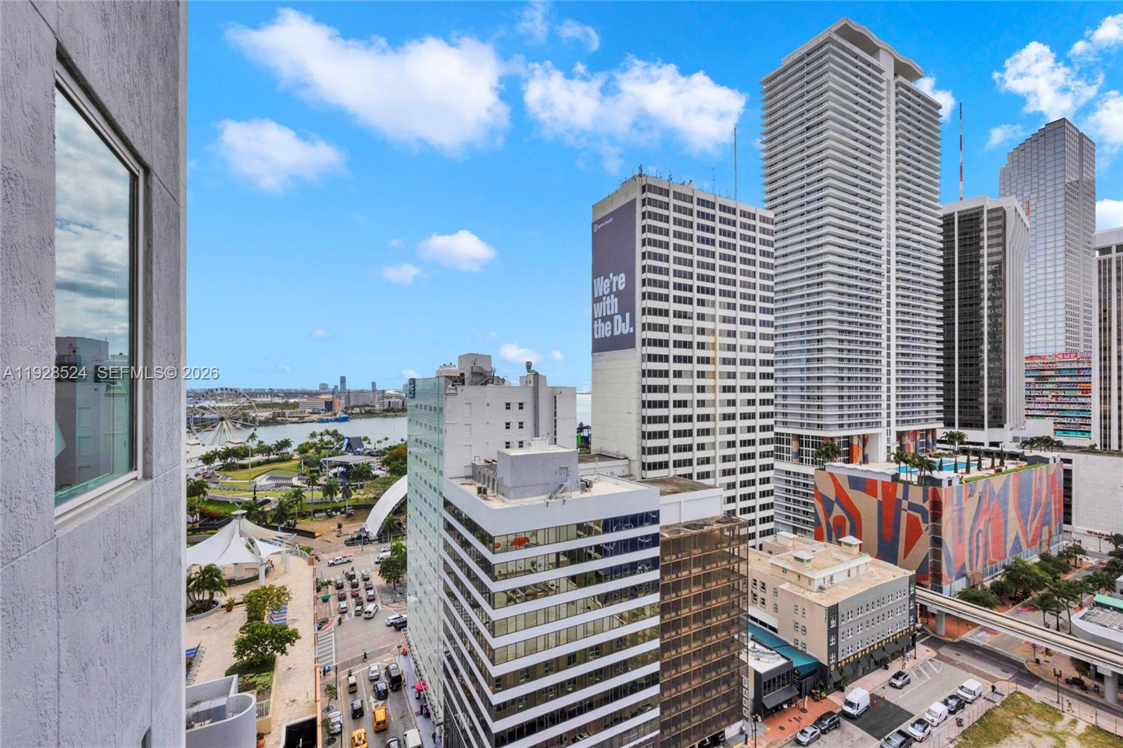 253 Northeast 2nd Street, Unit 1710 Miami, FL 33132 - Photo 22 of 22 a view of a balcony with a potted plant