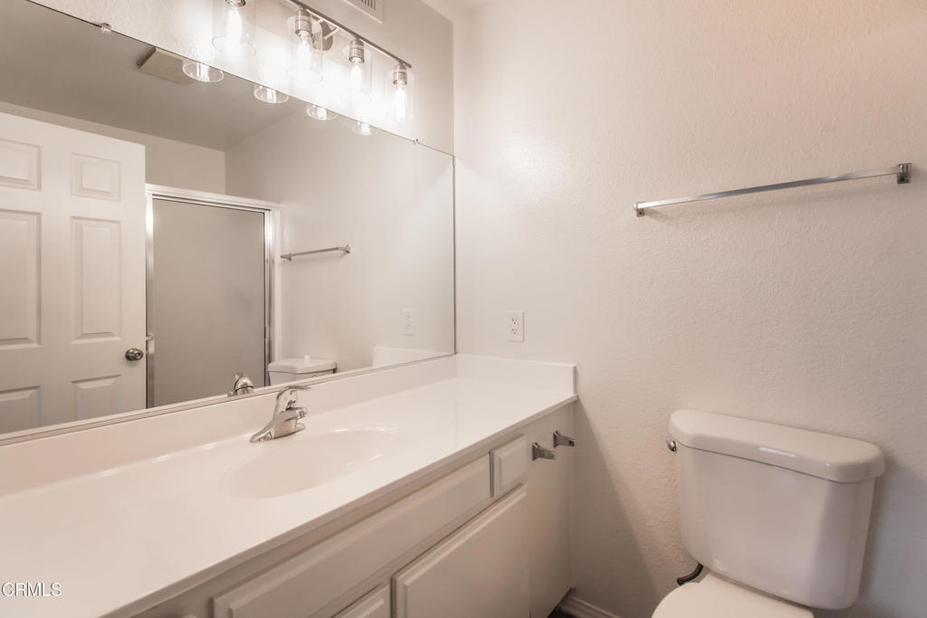 1169 Rosedale Avenue, Unit 204 Glendale, CA 91201 - Photo 11 of 27 a bathroom with a sink toilet and shower