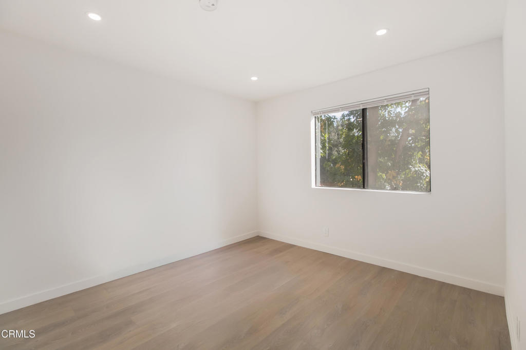 1169 Rosedale Avenue, Unit 204 Glendale, CA 91201 - Photo 14 of 27 an empty room with a window