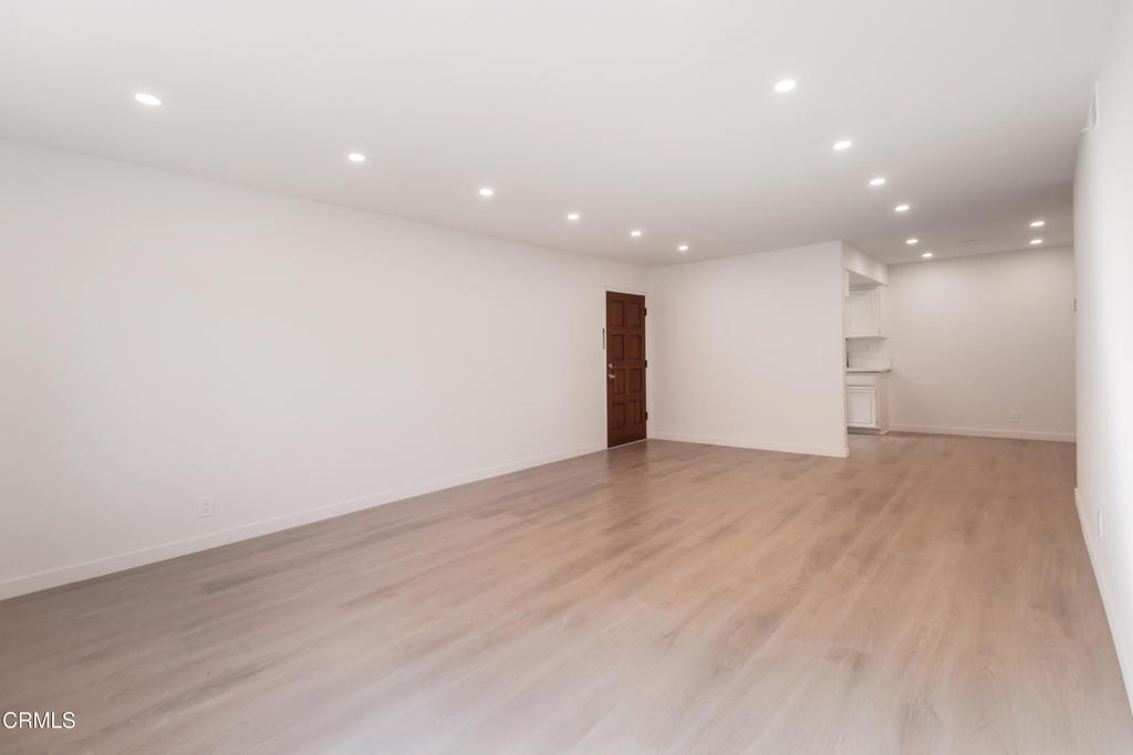1169 Rosedale Avenue, Unit 204 Glendale, CA 91201 - Photo 4 of 27 a view of an empty room with wooden floor