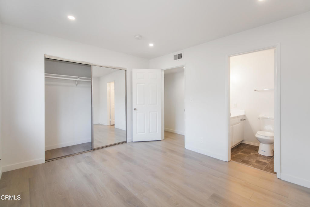 1169 Rosedale Avenue, Unit 204 Glendale, CA 91201 - Photo 9 of 27 a view of a room with wooden floor and bathroom view
