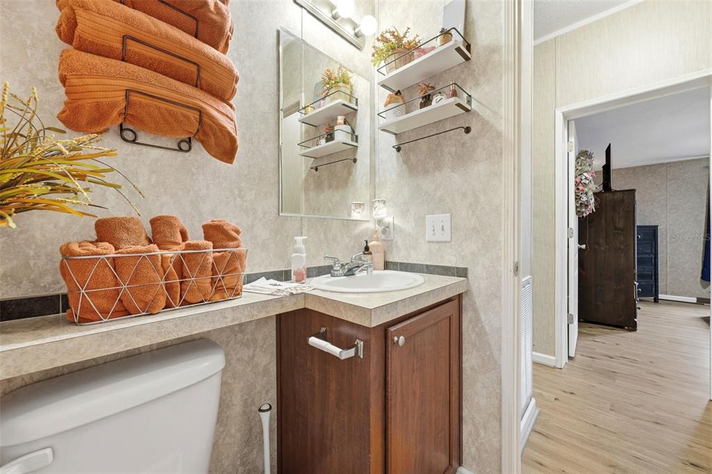 104 Ferncreek Drive Georgetown, FL 32139 - Photo 23 of 52 a bathroom with a sink and a mirror