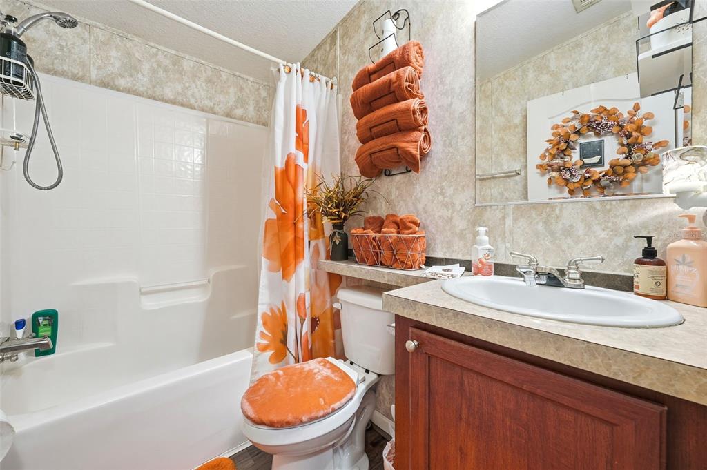 104 Ferncreek Drive Georgetown, FL 32139 - Photo 24 of 52 a bathroom with a sink a toilet and shower