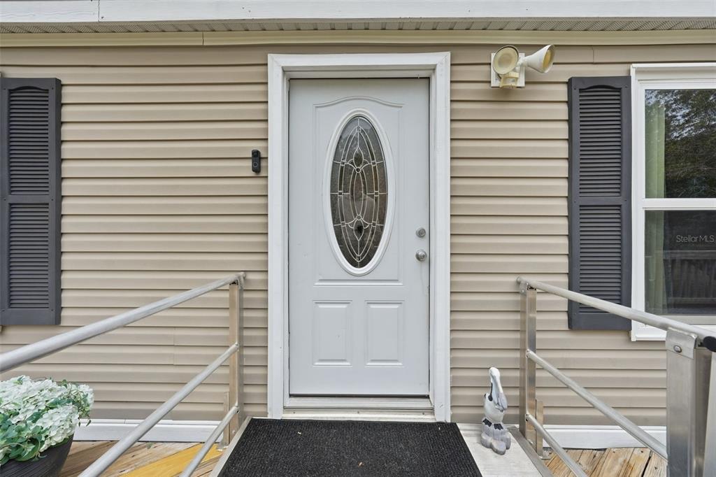 104 Ferncreek Drive Georgetown, FL 32139 - Photo 27 of 52 a front view of a house with garden