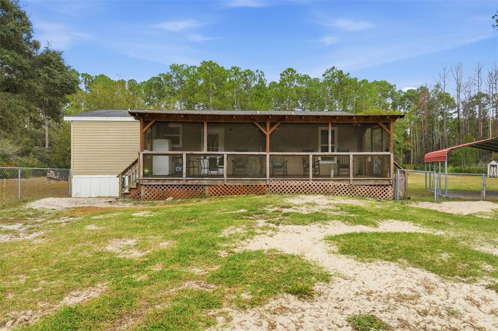 104 Ferncreek Drive Georgetown, FL 32139 - Photo 37 of 52 a view of a house with a backyard