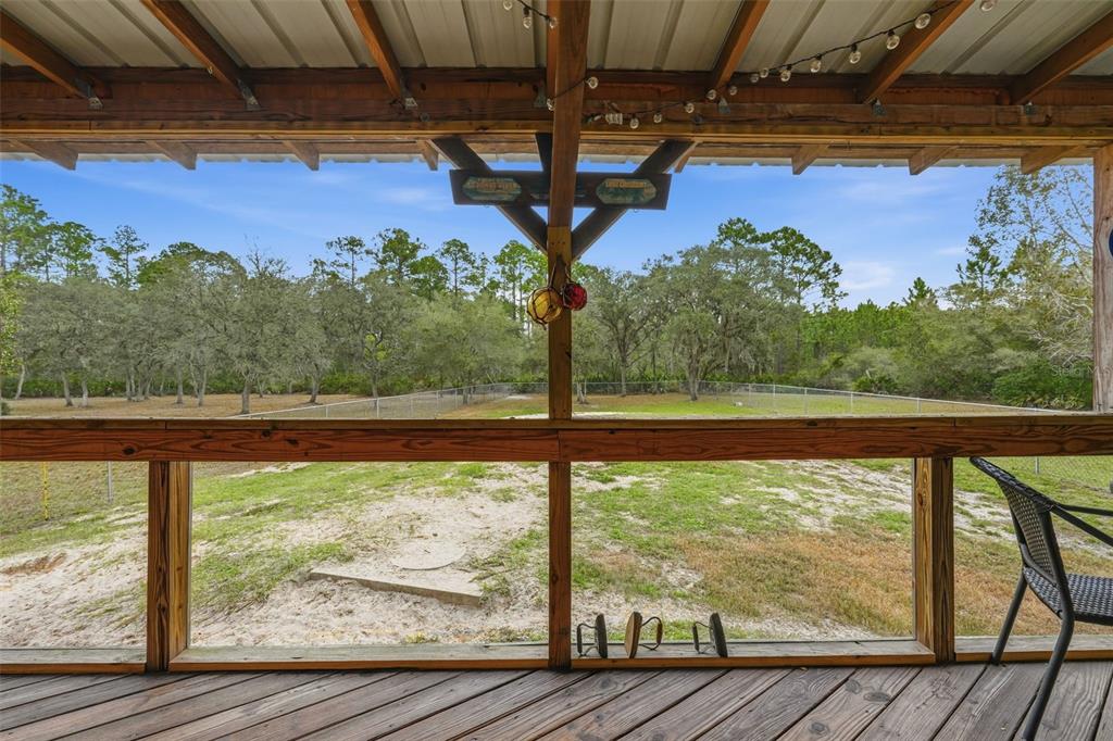 104 Ferncreek Drive Georgetown, FL 32139 - Photo 39 of 52 a view of a porch with wooden floor