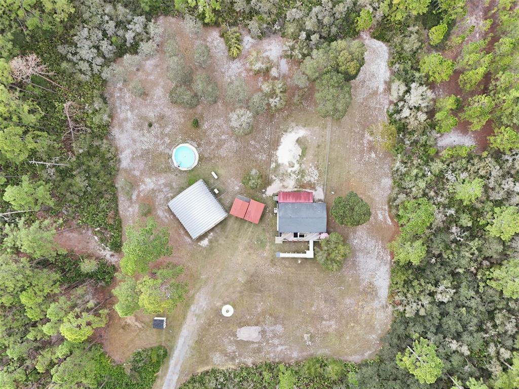 104 Ferncreek Drive Georgetown, FL 32139 - Photo 44 of 52 an aerial view of residential house with outdoor space and parking