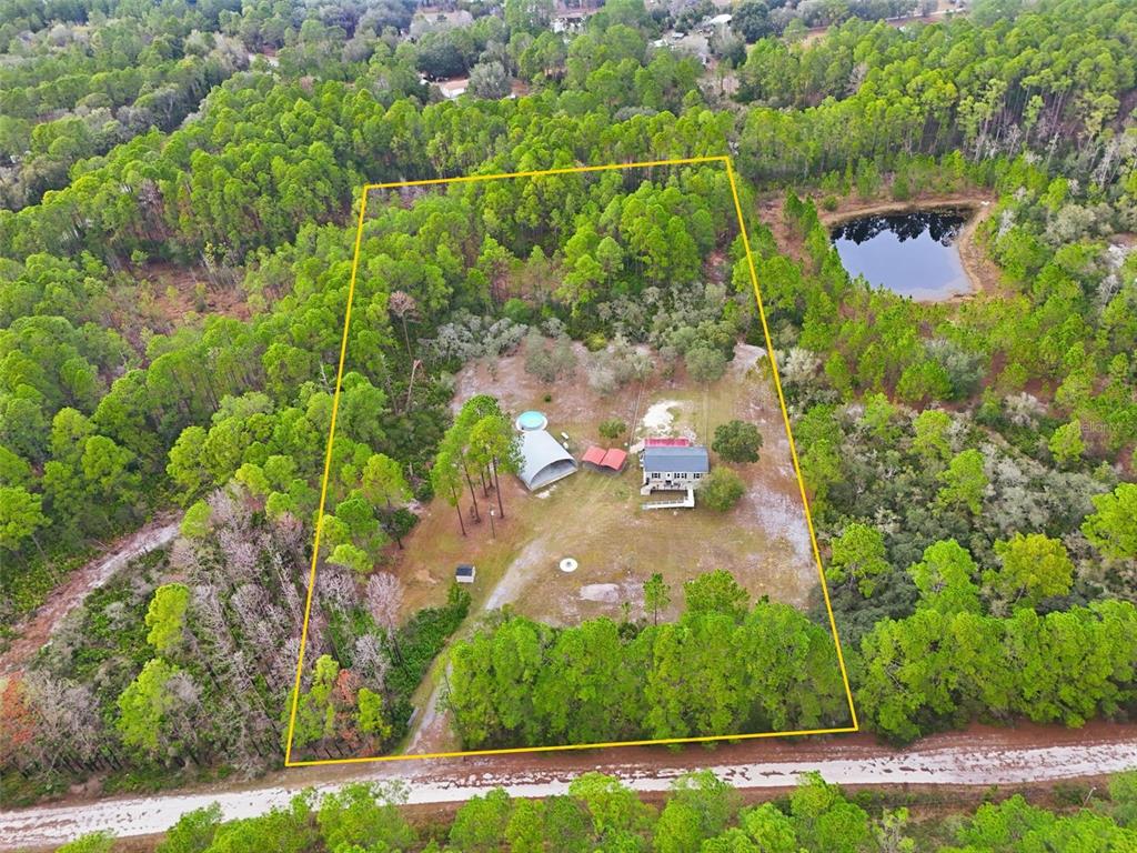 104 Ferncreek Drive Georgetown, FL 32139 - Photo 5 of 52 an aerial view of a houses with yard