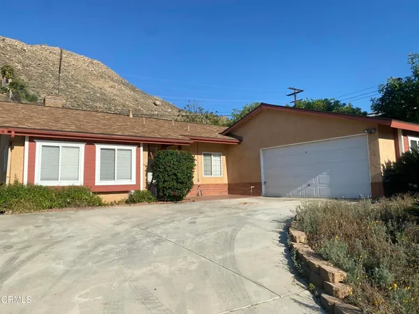 a view of a house with a patio
