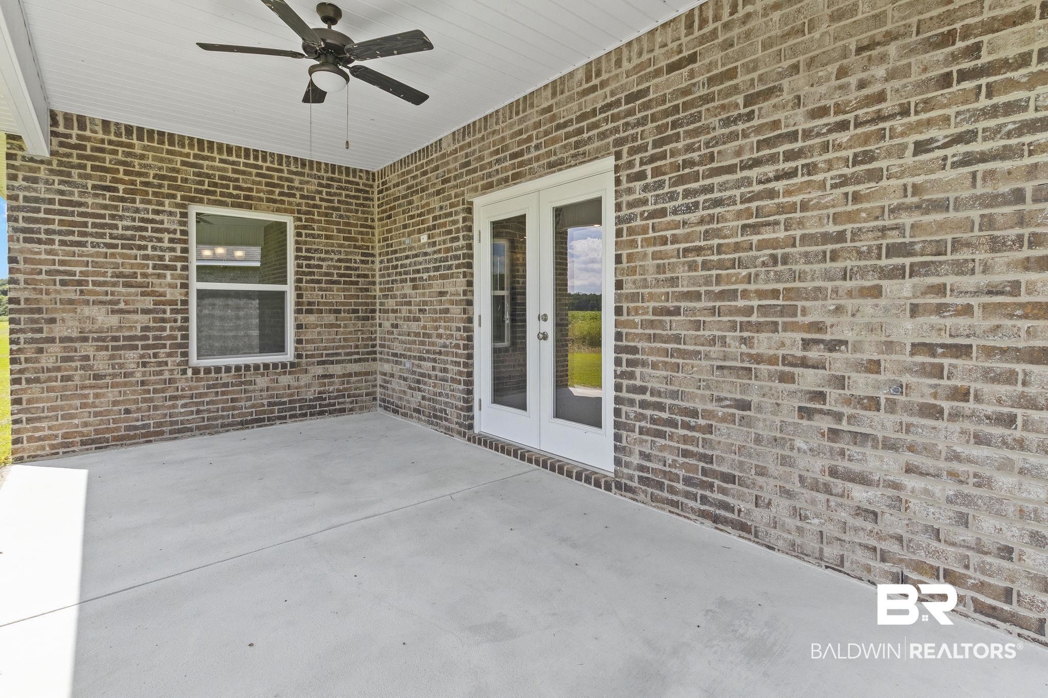 11303 Genuine Risk Circle Daphne, AL 36526 - Photo 74 of 100 View of patio featuring ceiling fan
