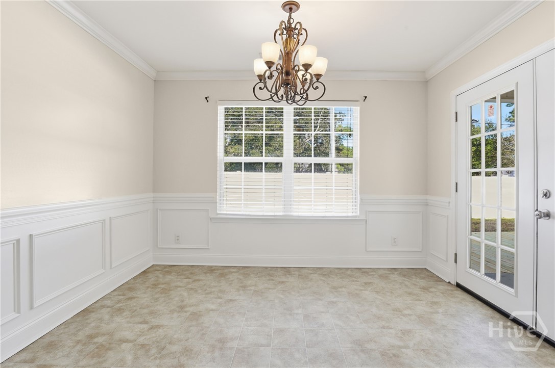 130 Terraza Lane Savannah, GA 31405 - Photo 14 of 31 Door to the Right Leads to Covered Patio, Patio Extended by Brand New Wood Deck - Great For???????????????????????????????????????? Entertaining!