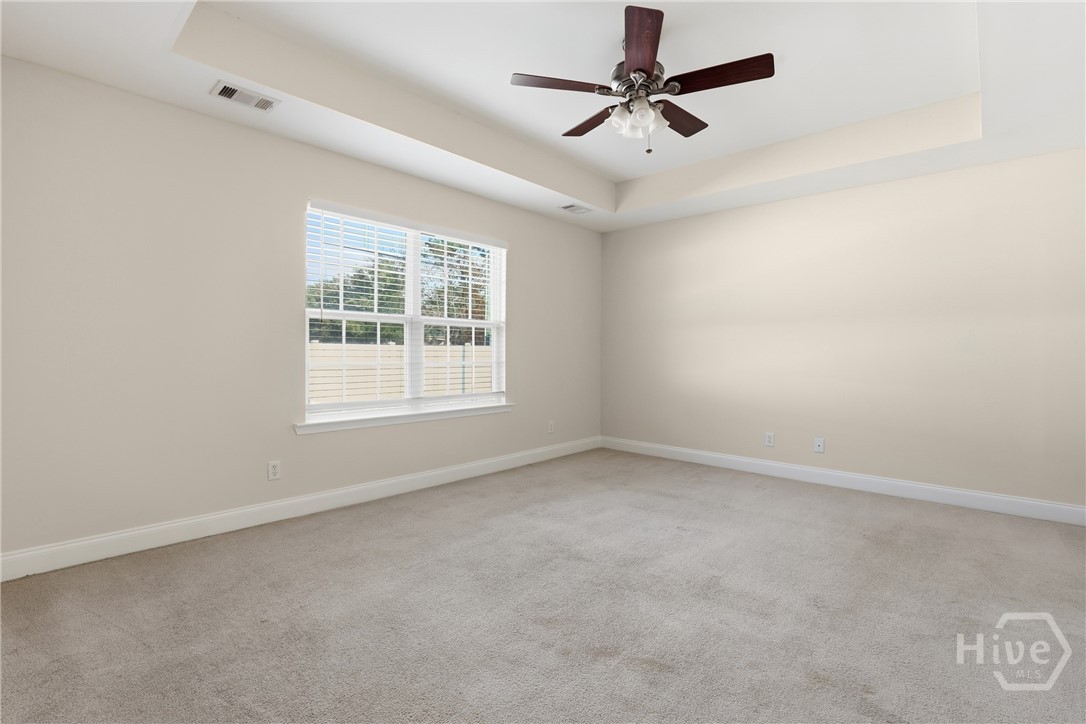 130 Terraza Lane Savannah, GA 31405 - Photo 16 of 31 Primary Suite Has Double Window, Trey Ceiling and Ceiling Fan