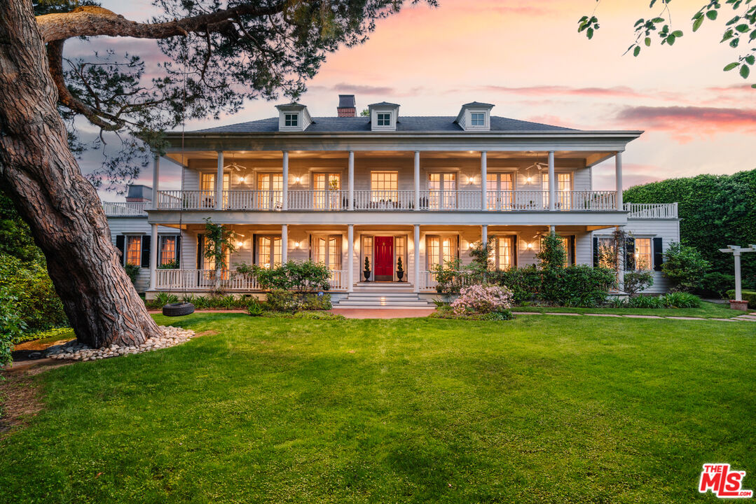 4261 Ledge Avenue Toluca Lake, CA 91602 - Photo 1 of 49 a view of a house with a yard porch and sitting area