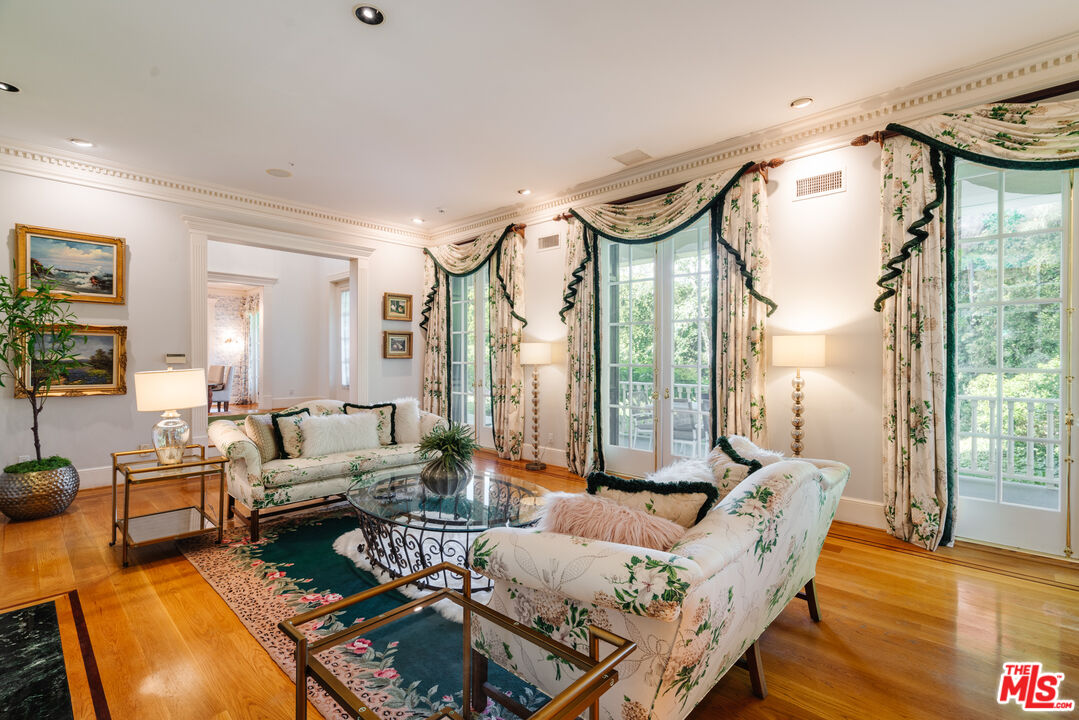 4261 Ledge Avenue Toluca Lake, CA 91602 - Photo 11 of 49 a living room with furniture and a window