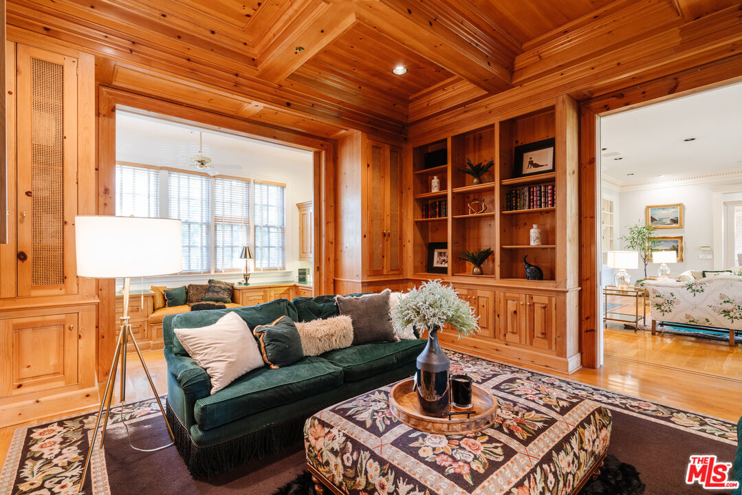 4261 Ledge Avenue Toluca Lake, CA 91602 - Photo 13 of 49 a living room with furniture and a potted plant