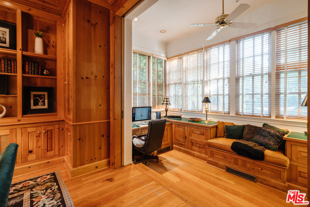 4261 Ledge Avenue Toluca Lake, CA 91602 - Photo 14 of 49 a large living room with windows