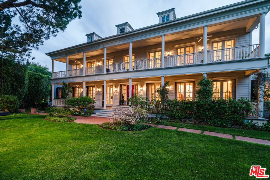 4261 Ledge Avenue Toluca Lake, CA 91602 - Photo 2 of 49 a front view of house with yard and green space
