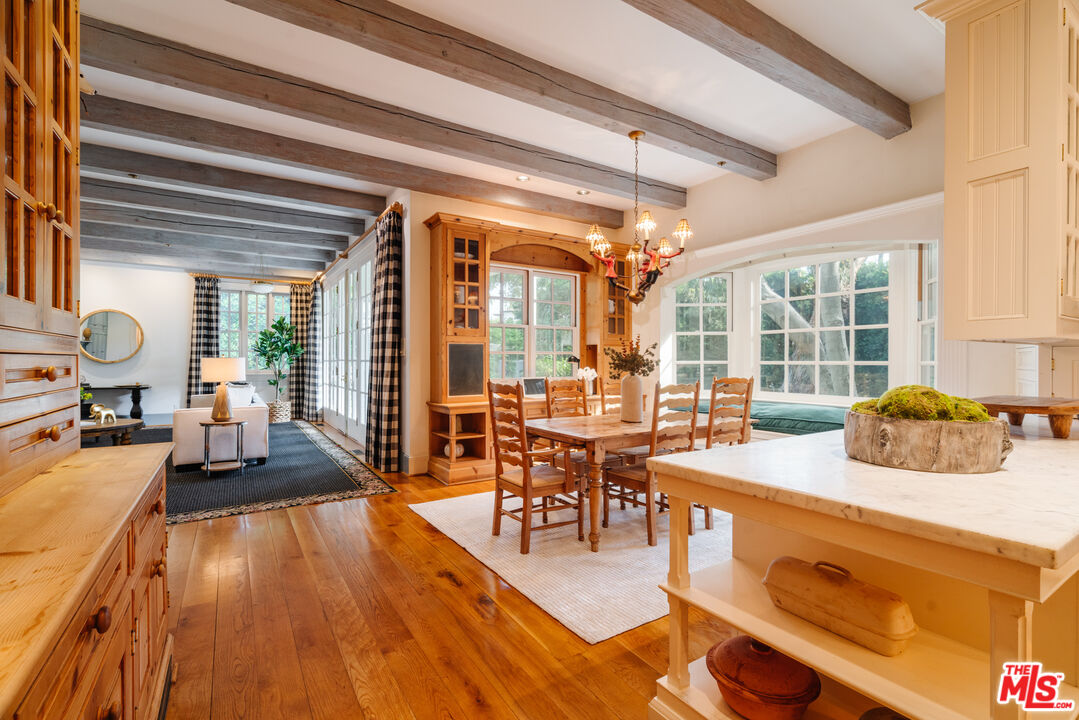 4261 Ledge Avenue Toluca Lake, CA 91602 - Photo 21 of 49 a view of a dining room with furniture window and outside view