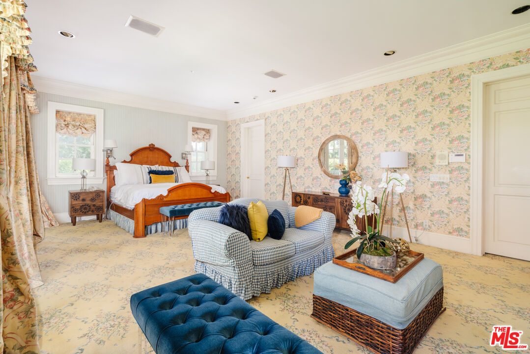 4261 Ledge Avenue Toluca Lake, CA 91602 - Photo 30 of 49 a living room with furniture a rug and a window
