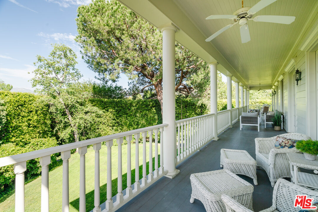 4261 Ledge Avenue Toluca Lake, CA 91602 - Photo 36 of 49 a view of a porch with furniture