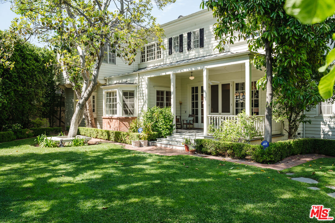 4261 Ledge Avenue Toluca Lake, CA 91602 - Photo 48 of 49 front view of a house with a yard
