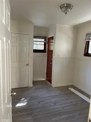 a view of a livingroom with wooden floor