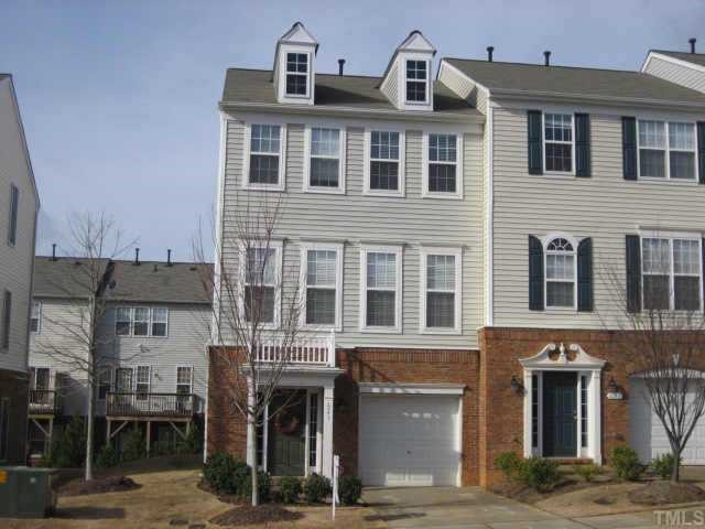 a front view of a building with many windows