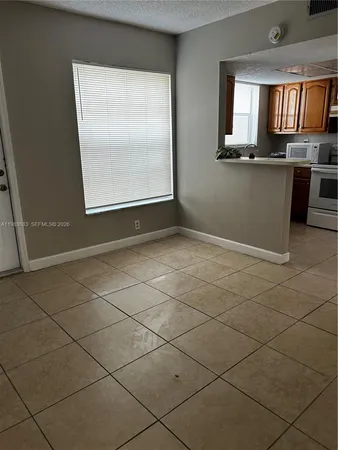 a view of kitchen and window