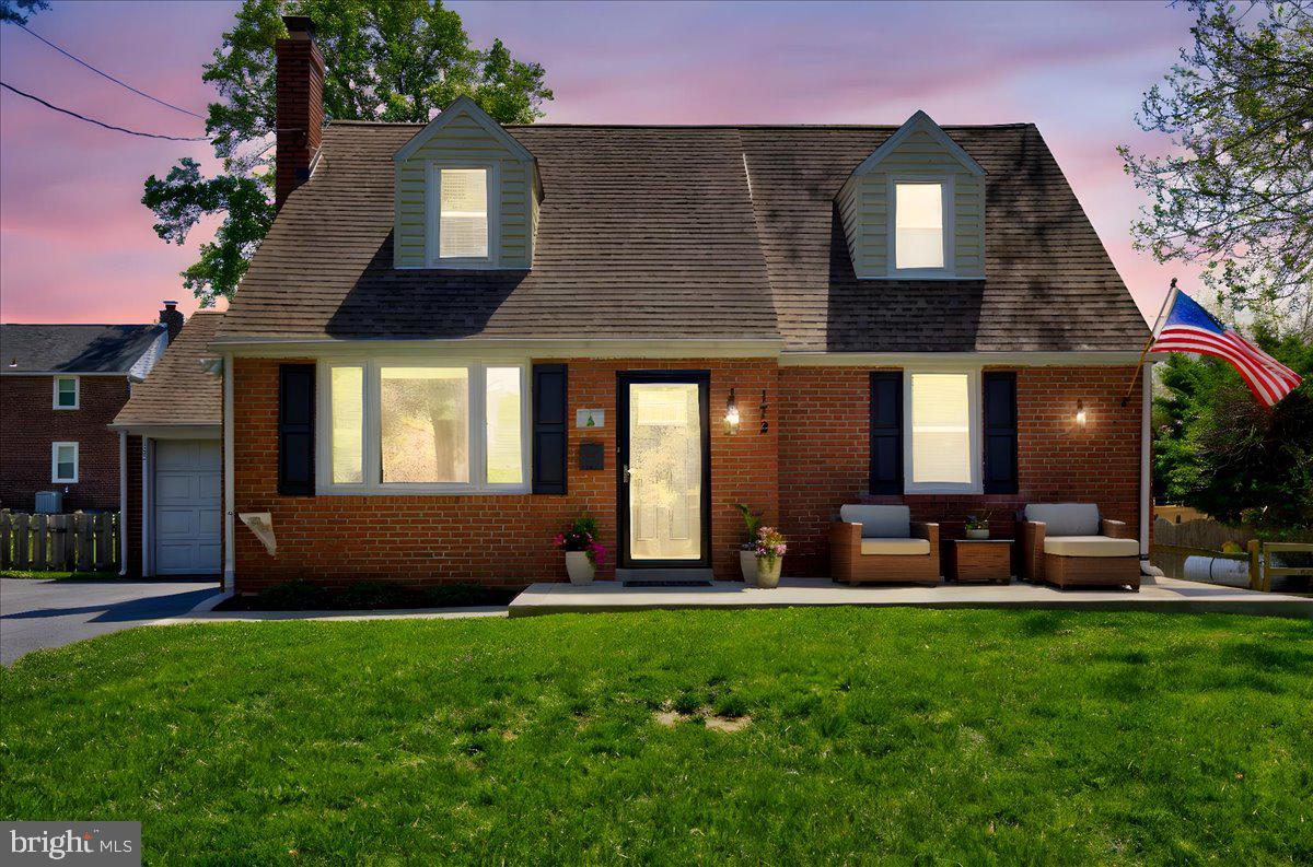 172 Scenic Road Springfield, PA 19064 - Photo 3 of 40 a front view of a house with garden