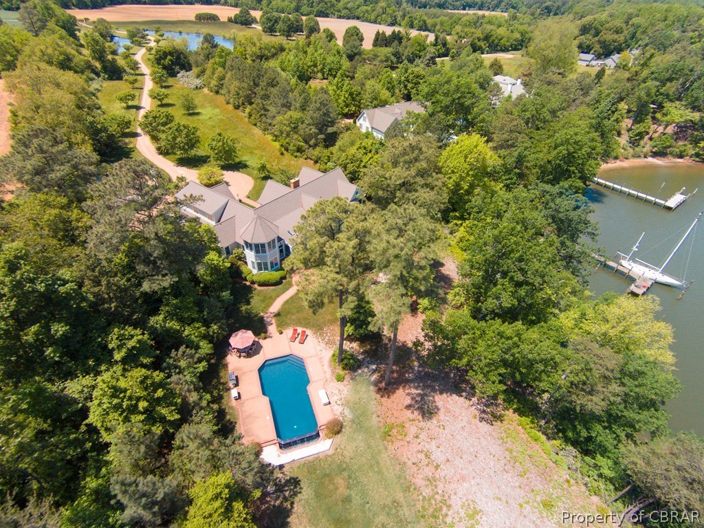 1193 West Point Road Lancaster, VA 22503 - Photo 5 of 50 an aerial view of residential houses with outdoor space and trees