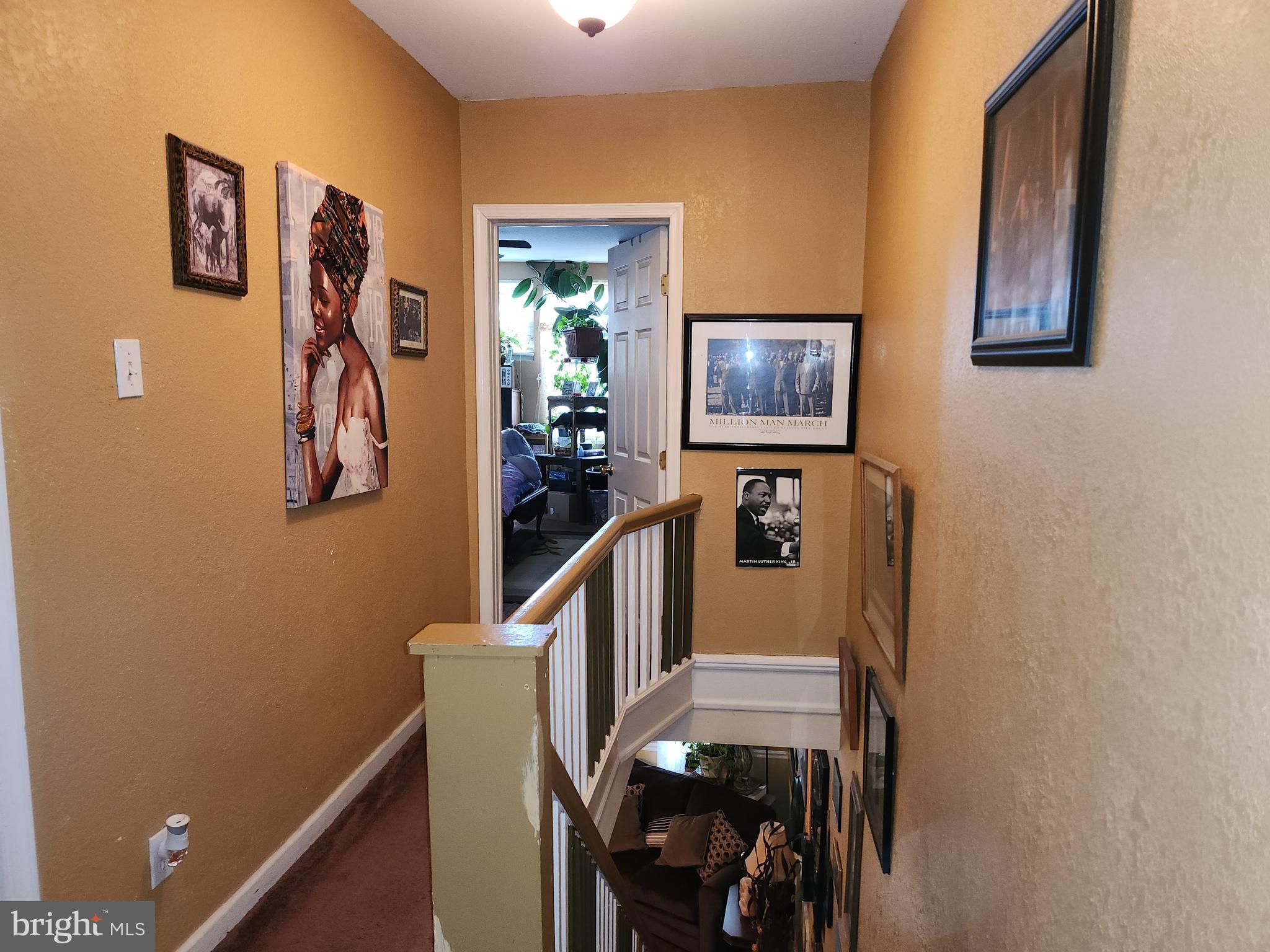 6002 North 19th Street Philadelphia, PA 19141 - Photo 17 of 25 a view of a hallway with workspace