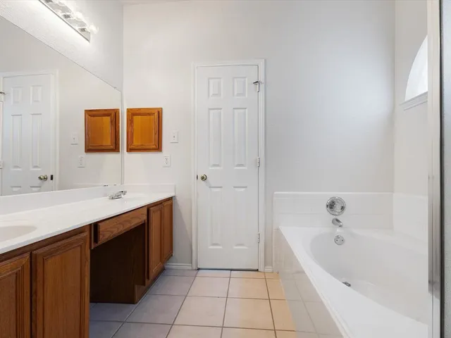 a bathroom with a sink a toilet and a bathtub