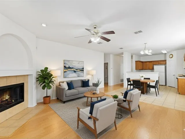 a view of a house with a backyard