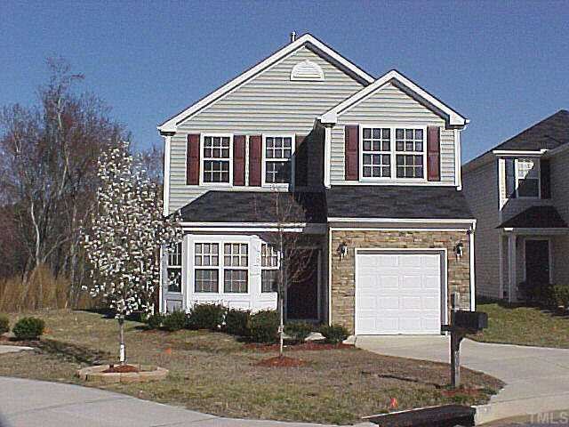 5004 Tommans Trail Raleigh, NC 27616 - Photo 1 of 1 a front view of a house with a yard