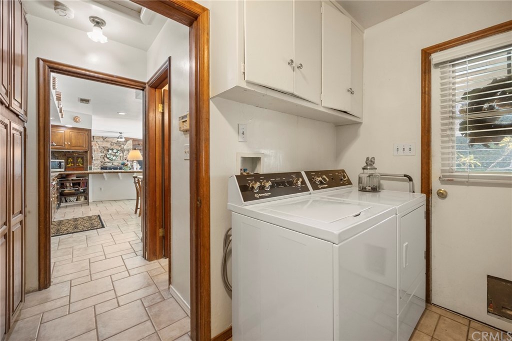 610 Laguna Road Fullerton, CA 92835 - Photo 12 of 29 a utility room with dryer and washer